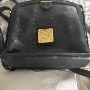 Vintage-Inspired Black and Gold Crossbody Bag